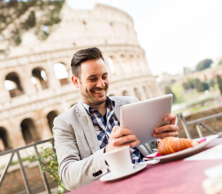 young-man-sitting-having-cup-coffee-rome-italy